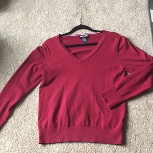 Red V-neck sweater